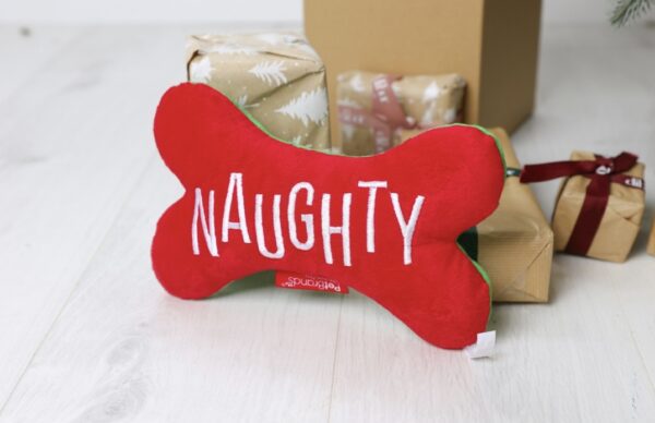 Screenshot Naughty/Nice Reversible Bone Plush Toy